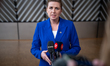 Denmark's Prime Minister Mette Frederiksen speaks to journalists as she arrives prior to t...