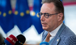 Belgium's Prime Minister Bart De Wever speaks to journalists as he arrives prior to the Eu...