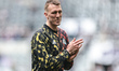 Dan Burn of Newcastle United participates in the pregame warmup session during the Premier...
