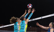 Rebekah Allick #5 and Lauren Carlini #7 of LOVB Madison attempt a block against LOVB Houst...