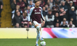 Matty Cash of Aston Villa controls the ball during the Premier League match between Aston...