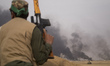 An Iraqi Shi'ite fighter from the Popular Mobilization Forces (PMF), also known as Hashd a...