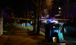 Members of the crime scene unit and U.S. Park Police work at the scene where a U.S. Park P...