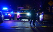 Members of the crime scene unit and U.S. Park Police work at the scene where a U.S. Park P...