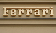 Ferrari logo signage is mounted on a building facade in Munich, Bavaria, Germany, on March...