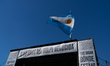 A close-up of the stage set up in Plaza de Mayo shows the inscriptions: '50 years since th...