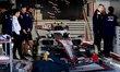 A team works on the car of Formula 1 driver Oliver Bearman of the TGR Haas F1 Team during...