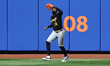 Pittsburgh Pirates outfielder Oneil Cruz #15 makes a catch during the fifth inning of a ba...