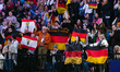 Fans show their support during the Pairs Free Skate at the ISU Figure Skating World Champi...