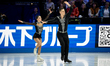Karina Akopova and Nikita Rakhmanin of Armenia perform in the pairs short program during t...
