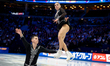 Karina Akopova and Nikita Rakhmanin of Armenia perform in the pairs short program during t...