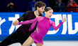 Ioulia Chtchetinina and Michal Wozniak of Poland perform in the pairs short program during...