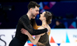 Annika Hocke and Robert Kunkel of Germany perform in the pairs short program during the IS...