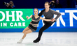 Alisa Efimova and Misha Mitrofanov of the United States perform in the pairs short program...