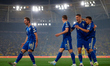 Viktor Gyokeres (right) of Sweden celebrates with teammates after scoring the team's first...