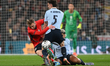 Jarrod Bowen of England is challenged by Manuel Ugarte of Uruguay during the International...