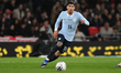 Mathias Olivera of Uruguay moves forward during the international friendly match between E...