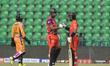 Yasir Khan celebrates a fifty score with teammates Muhammad Rizwan during the Pakistan Sup...