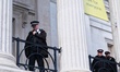 Greenpeace activists climb the pillars of the National Gallery in London, United Kingdom,...