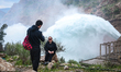 Authorities at the Darbandikhan Dam discharge excess water through the spillways following...