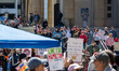 Demonstrators participate in the nationwide No Kings 3 national day of protest in Cincinna...