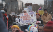 People gather for the No Kings rally in Boston, United States, on March 28, 2026. An estim...