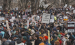People gather for a No Kings rally in Boston, United States, on March 28, 2026. An estimat...