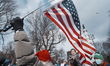 People gather for the No Kings rally in Boston, United States, on March 28, 2026. An estim...