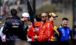 Drivers participate in a parade during the Formula 1 Japan Suzuka race at the Suzuka Formu...