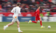 Joel Waterman #5 of Canada runs with the ball during the International Friendly match betw...
