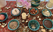 Traditional items adorn a Haft Sin (Haft Seen), an arrangement of seven symbolic items tha...