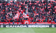 Fans cheer for Team Canada during an international friendly match against Iceland at BMO F...