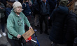 People participate in a ''No Kings'' protest march against President Donald Trump and his...