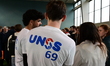 A person wears a National Union of School Sports t-shirt during the launch of the 2026 Oly...