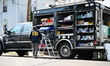 Members of the FBI Evidence Response Team collect evidence following the discovery of a su...