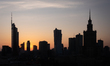 The skyline of central Warsaw is silhouetted at sunset in Warsaw, Poland, on March 29, 202...