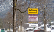 A roadside warning sign reading ''Achtung Wildwechsel'' alerts drivers to wildlife crossin...
