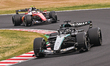 SUZUKA, JAPAN - MARCH 29: 
 George Russell of Mercedes-AMG Petronas F1 Team leads ahead o...