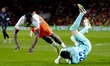 Brian Brobbey of the Netherlands and goalkeeper Gonzalo Valle of Ecuador during the friend...