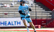 Matt Collison of the Johns Hopkins Blue Jays holds the ball during an NCAA men's lacrosse...