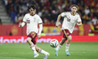 Pedri (20) of Spain and Fermin Lopez (22) of Spain control the ball during the internation...