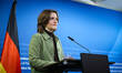 Elisabeth Kaiser attends a press event at the Federal Ministry of Finance regarding the ap...