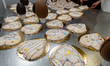 Freshly baked scarcelle, traditional Apulian pastries made during the Easter season, are d...