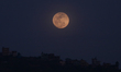 A full moon rises over Bhaktapur, Nepal, on March 1, 2026. 