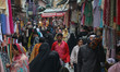 People walk through a market in Srinagar, Jammu and Kashmir, on April 02, 2026. India has...
