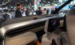 A toy VW bus model is seen on the dashboard of the Volkswagen ID. Buzz at the New York Int...
