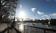 Seagulls are seen at the London Eye with Big Ben in the background in London, United Kingd...
