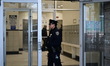 NYPD officers work at the scene where police fatally shoot 44-year-old Lucien Colon at 105...