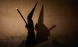 A penitent participates in the Hermandad de la Concha (Brotherhood of the Conception) proc...