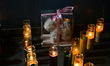 A vigil with teddy bears, flowers, and candles is held one day after a 7-month-old girl, i...